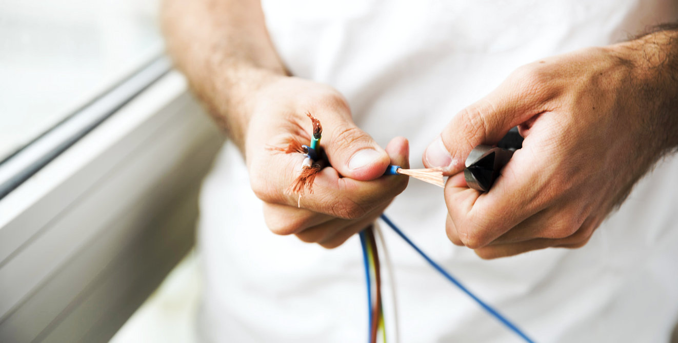 engineer fixing a wire