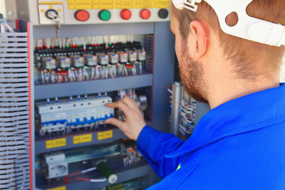 engineer checking electrical cabinet